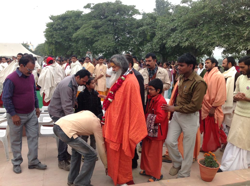 Swamiji entering function amidst chorus of mantras Swamiji entering function amidst chorus of mantras