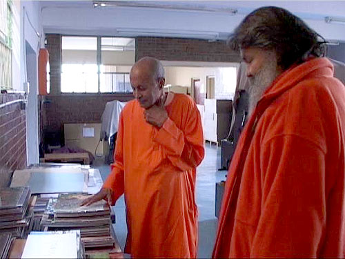 Swamiji Sahajanandji shows Swamiji the printing press room Swamiji Sahajanandji shows Swamiji the printing press room