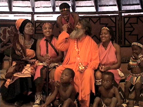 Swamiji gives prashad Swamiji gives prashad