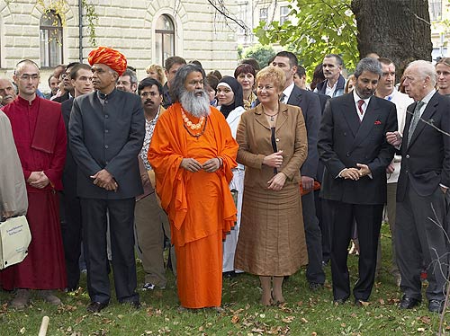 Planting a peace tree near the Summit venue Planting a peace tree near the Summit venue