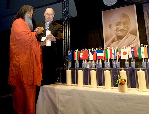 His Holiness Vishwaguru Paramhans Swami Maheshwaranandaji and Monsignor David Cappo are kindling a candle during the opening act of the World Peace Summit 2007 His Holiness Vishwaguru Paramhans Swami Maheshwaranandaji and Monsignor David Cappo are kindling a candle during the opening act of the World Peace Summit 2007