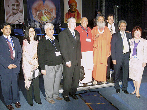 Group photo of some the main guests: Ramu Damodaran, from the United Nations, Chief of the Civil Society Outreach Division, the Ambassador of India to the Slovak Republic, Her Excellency Homai Saha, Sri Gulab Kothari, Dr. Timi Ecimovic, an eminent climate change scientist, researcher and lecturer, His Holiness Mahamandaleshwar Swami Niranjananda Maharaj, His Holiness Vishwaguru Paramhans Swami Maheshwarananda, Ricaardoe Di Done, President of the Organization for the Protection of Children’s Rights, Bawa Jain, Secretary General of the World Council of Religious Leaders at the Millenium World Peace Summit of Religious Leaders, Rev. Tsu-Wei Zoe Chang, President of the United Nations Womens Guild Group photo of some the main guests: Ramu Damodaran, from the United Nations, Chief of the Civil Society Outreach Division, the Ambassador of India to the Slovak Republic, Her Excellency Homai Saha, Sri Gulab Kothari, Dr. Timi Ecimovic, an eminent climate change scientist, researcher and lecturer, His Holiness Mahamandaleshwar Swami Niranjananda Maharaj, His Holiness Vishwaguru Paramhans Swami Maheshwarananda, Ricaardoe Di Done, President of the Organization for the Protection of Children’s Rights, Bawa Jain, Secretary General of the World Council of Religious Leaders at the Millenium World Peace Summit of Religious Leaders, Rev. Tsu-Wei Zoe Chang, President of the United Nations Womens Guild